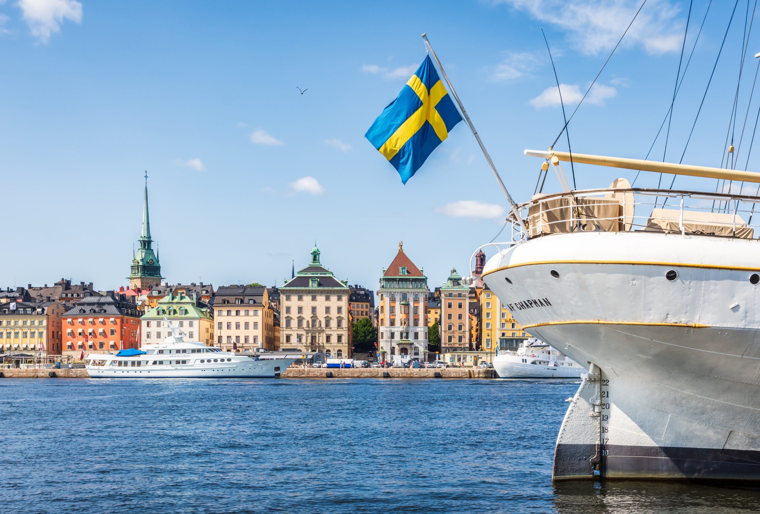 ship in front of city